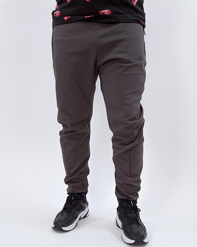 nike sportswear tech pack woven track pants